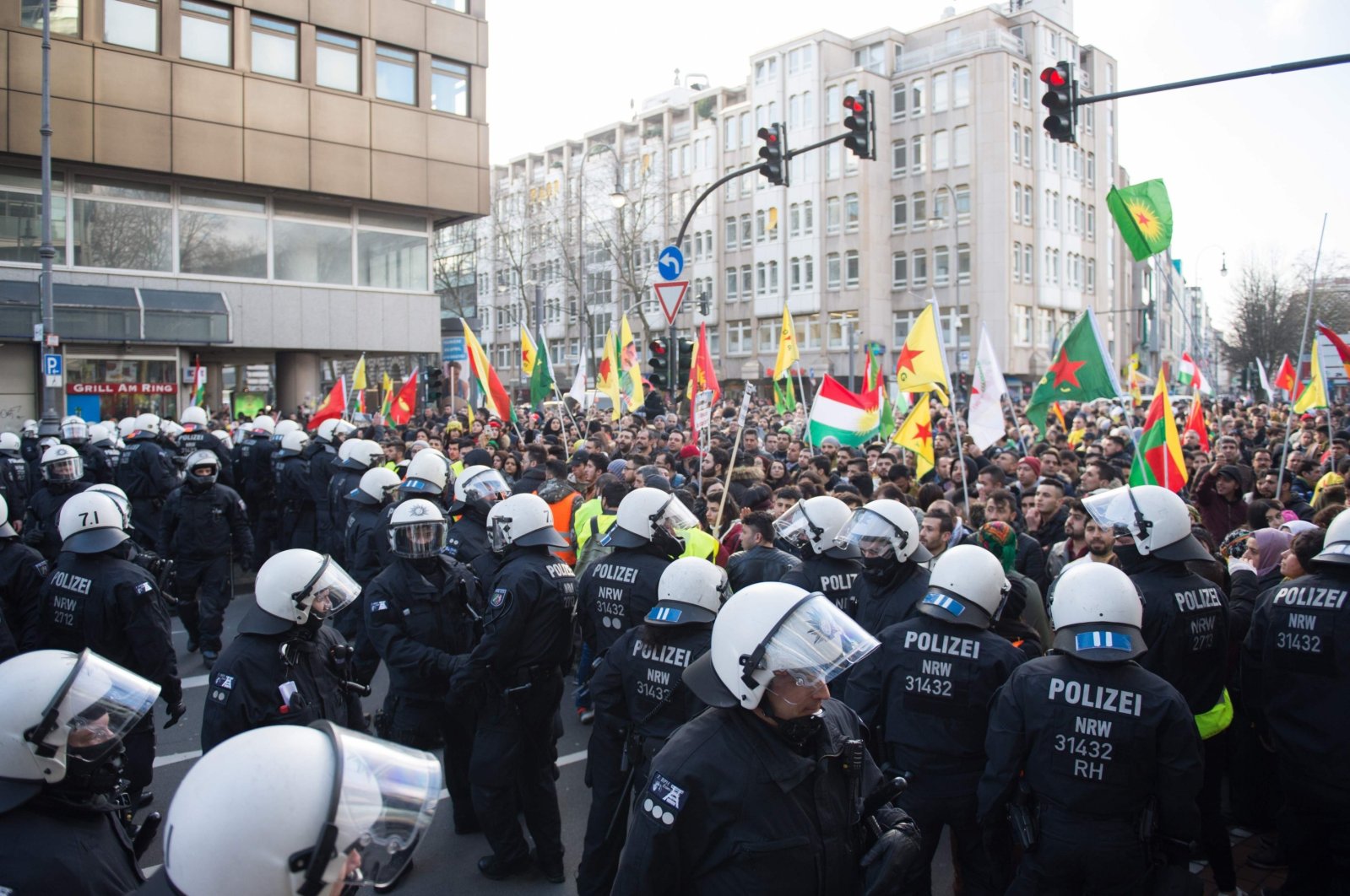 Police officers stop a pro-PKK mass demonstration in Cologne, western Germany, Jan. 27, 2018. (AFP)