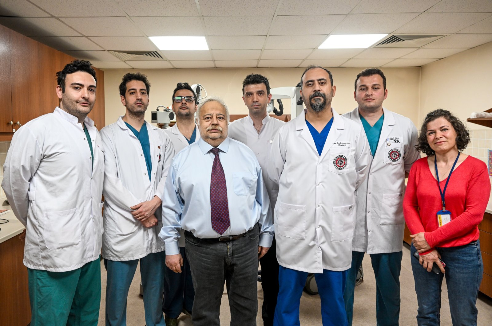 Professor Dr. Şükrü Çağlar (L-3) and Associate Dr. Ümit Eroğlu (R-3) are photographed with their team in Ankara, Türkiye, May 12, 2023. (AA Photo)