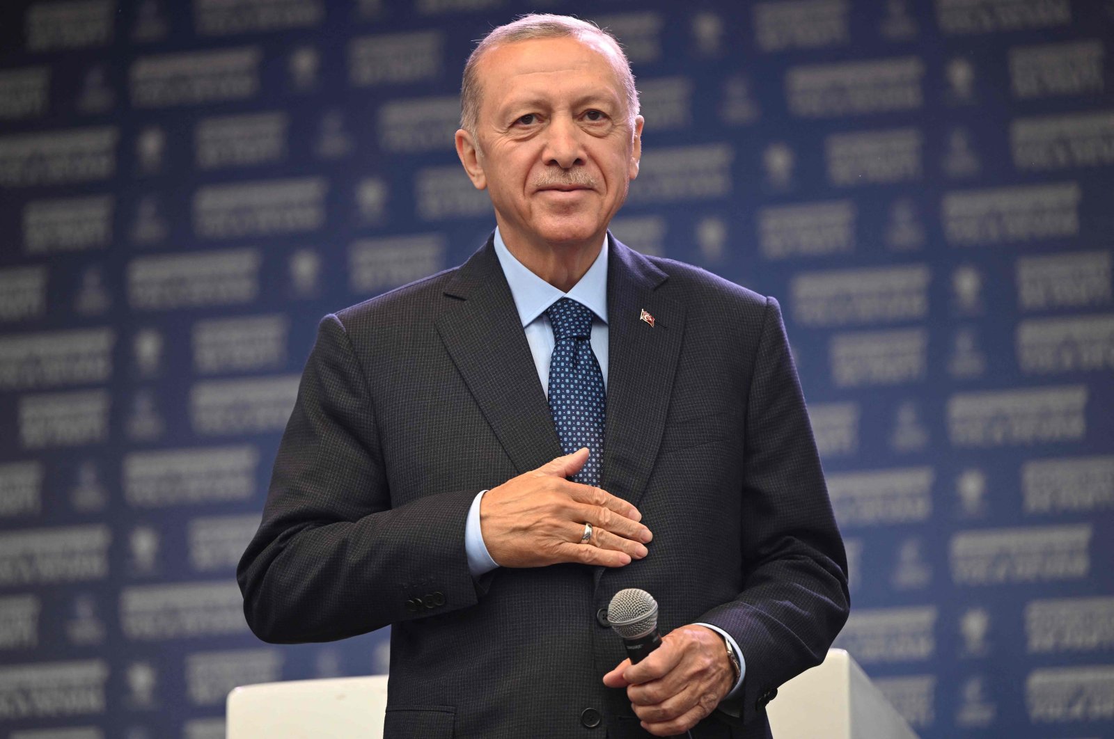 President Recep Tayyip Erdoğan looks on as he addresses a speech in Sultangazi, Istanbul, Türkiye, May 12, 2023. (AFP Photo)