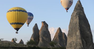 Hot air balloons soar in the skies over Cappadocia, Nevşehir, Türkiye, May 11, 2023. (AA Photo)
