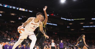 Phoenix Mercury&#039;s Brittney Griner (L) drives the ball against the Los Angeles Sparks during the first half of the WNBA game at Footprint Center, Phoenix, US., May 12, 2023. (AFP Photo)