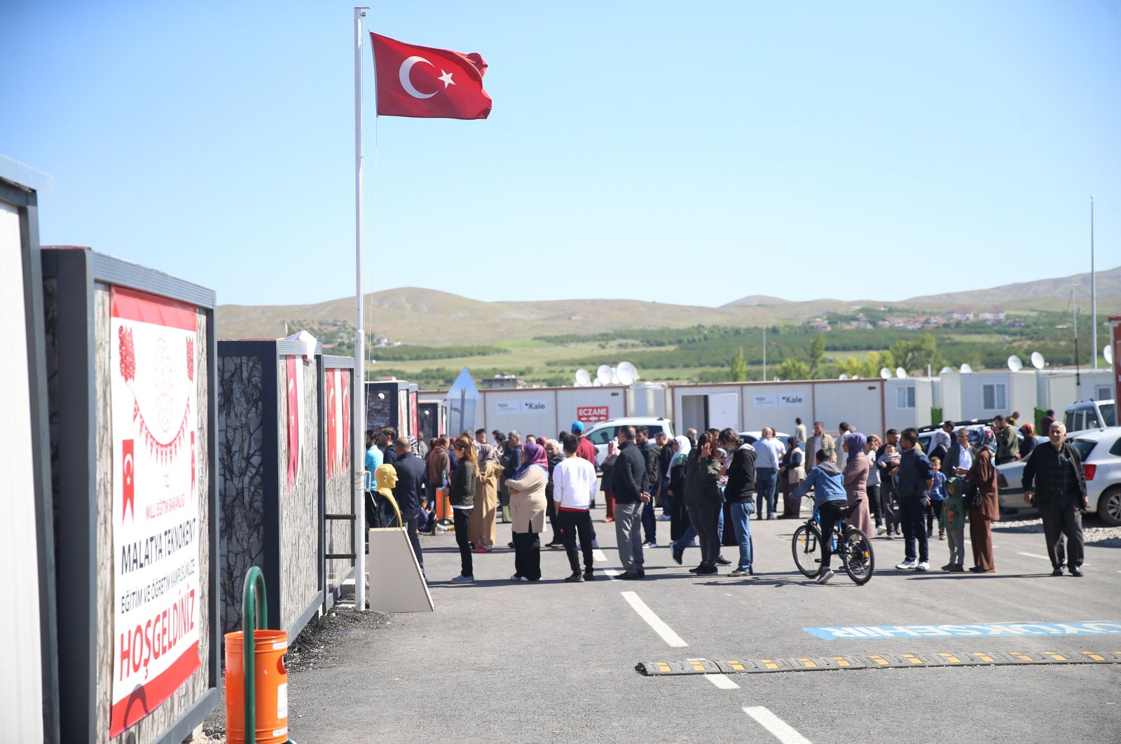 Voters queue to cast their ballots, in Malatya, Türkiye, May 14, 2023. (AA Photo)