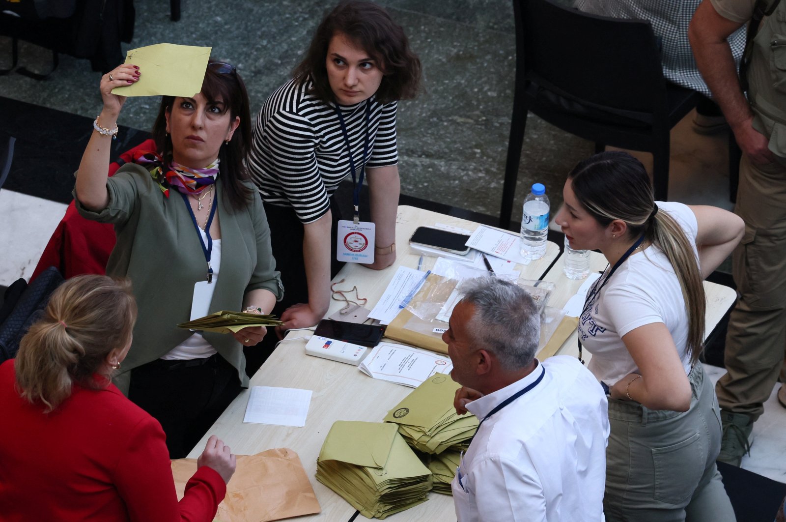 Election officials count votes from abroad on the day of presidential and parliamentary elections, in Ankara, Türkiye, May 14, 2023. (Reuters Photo)