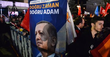 Supporters wave flags and banners as incumbent President Recep Tayyip Erdoğan makes an address at the Justice and Development Party (AK Party) headquarters after simultaneous parliamentary and presidential elections, Ankara, Türkiye, 15 May 2023. (EPA Photo)
