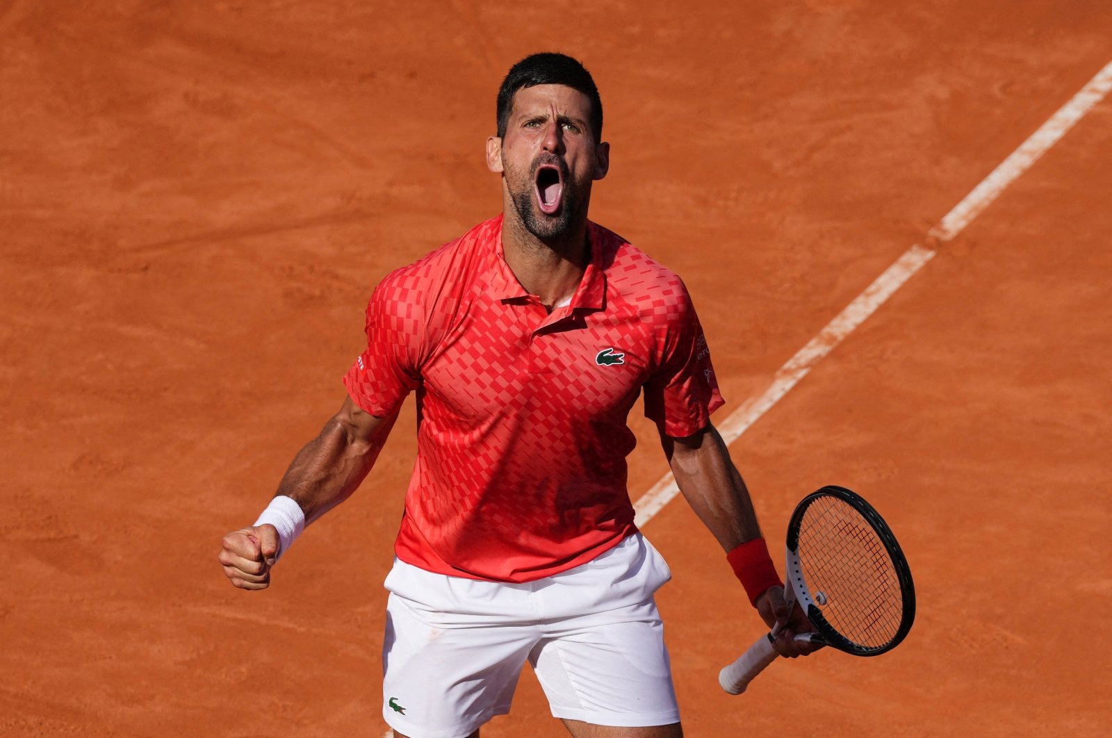 Serbia&#039;s Novak Djokovic reacts during his round of 32 match against Bulgaria&#039;s Grigor Dimitrov, Rome, Italy, May 14, 2023. (Reuters Photo)