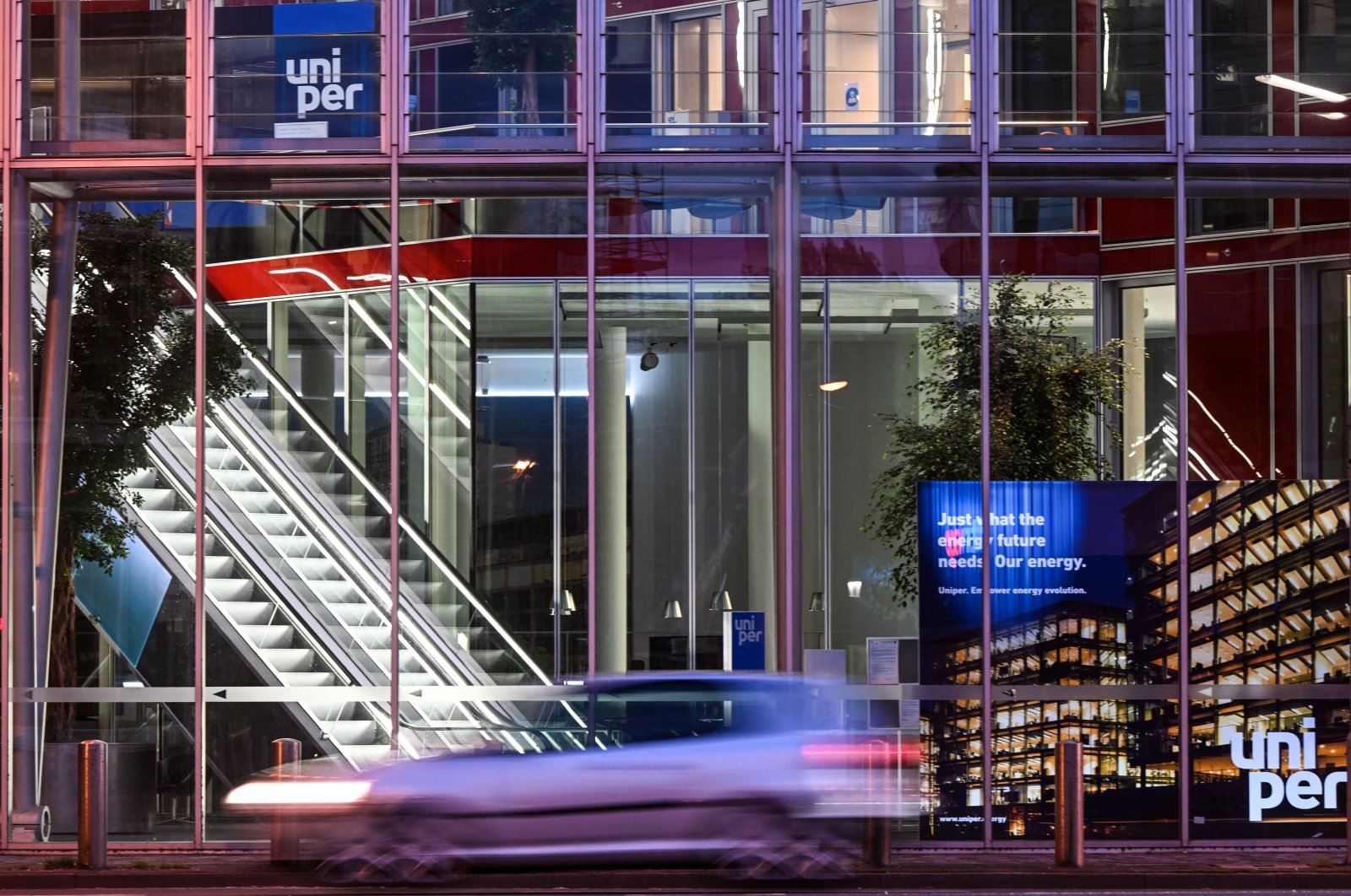 A car drives past Uniper&#039;s headquarters, in Duesseldorf, Germany, Sept. 20, 2022. (Reuters Photo)