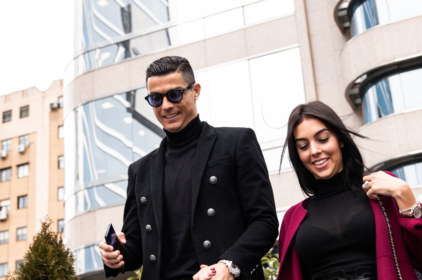 Portuguese player Cristiano Ronaldo leaves from the provincial court of Madrid with his girlfriend Georgina Rodriguez from his tax evasion trial, Madrid, Spain, Jan. 22, 2019. (Getty Images Photo)