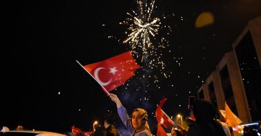 Supporters of President Recep Tayyip Erdoğan and the ruling Justice and Development Party (AK Party) react following early exit poll results for the presidential and parliamentary elections, in Istanbul, Türkiye, May 15, 2023. (Reuters Photo)