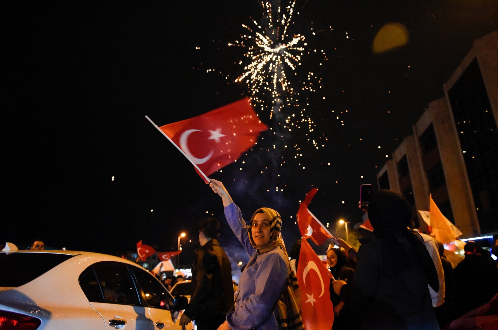 Supporters of President Recep Tayyip Erdoğan and the ruling Justice and Development Party (AK Party) react following early exit poll results for the presidential and parliamentary elections, in Istanbul, Türkiye, May 15, 2023. (Reuters Photo)