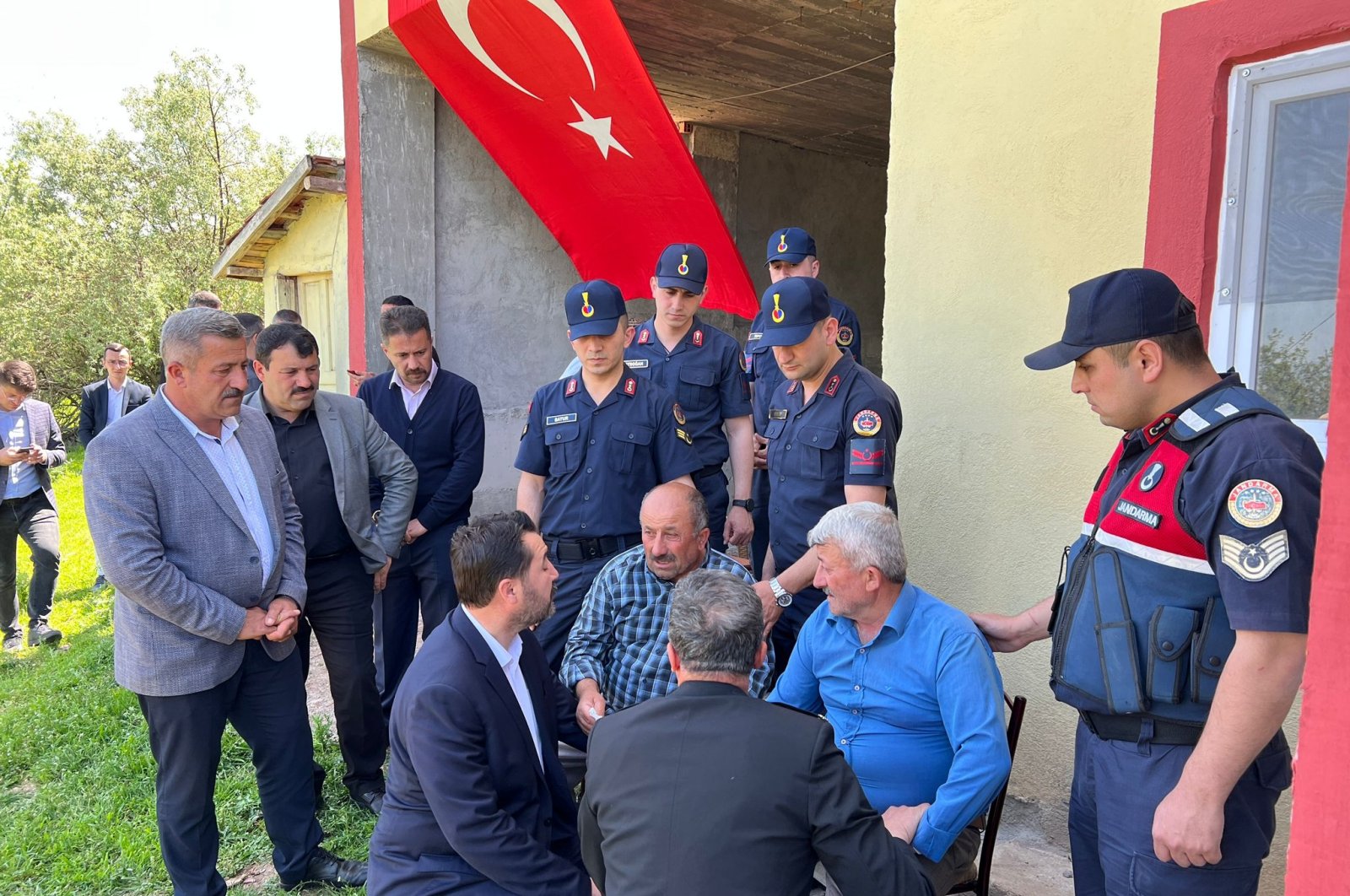 Military and civilian officials comfort the family of one of the soldiers killed by the PKK, in Tokat, northern Türkiye, May 16, 2023. (DHA Photo)