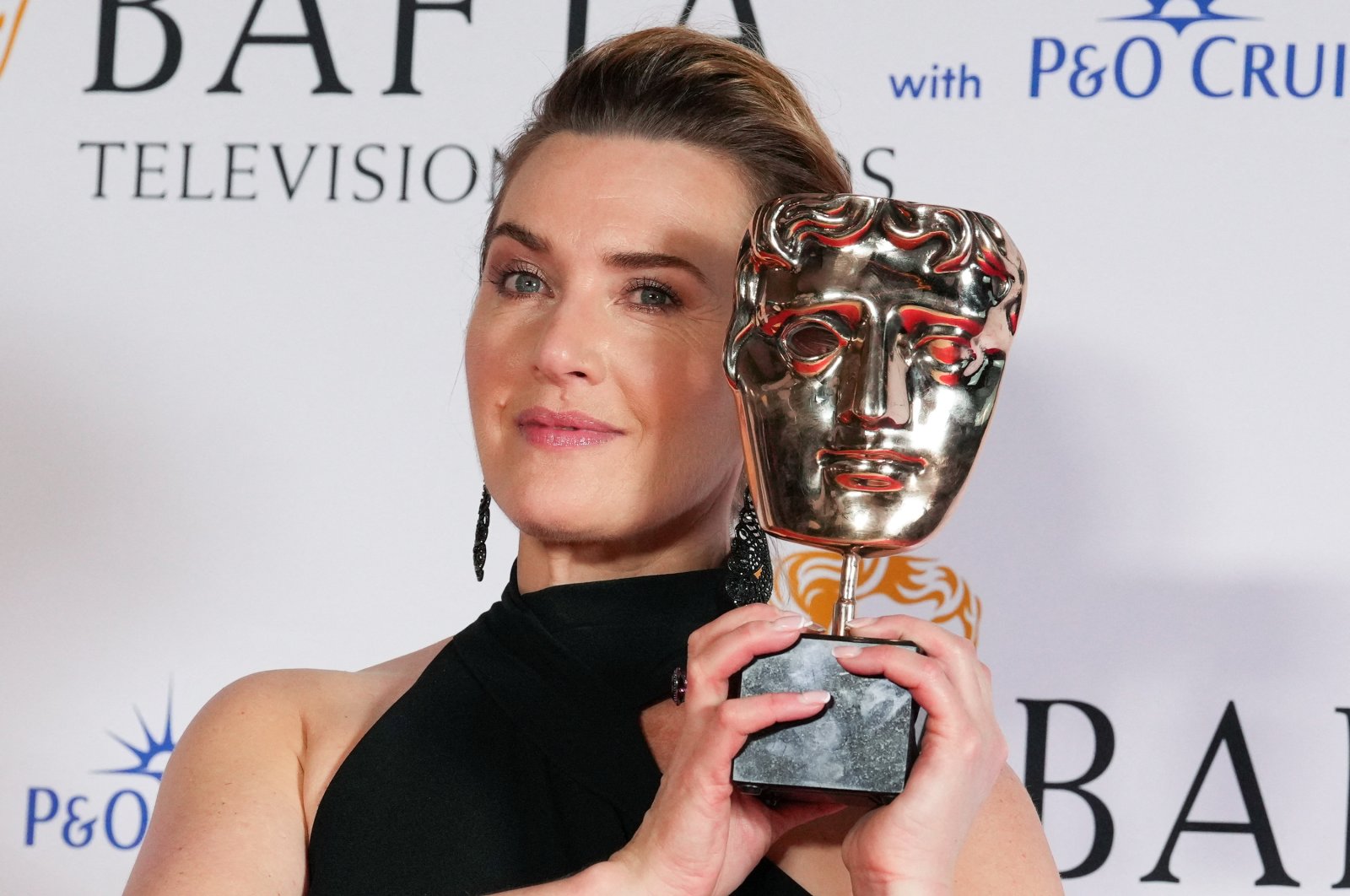 Kate Winslet, winner of the Leading Actress for &quot;I Am Ruth&quot; and with the Single Drama Award for &quot;I Am Ruth&quot; at the 2023 BAFTA Television Awards in London, U.K., May 14, 2023. (Reuters Photo)