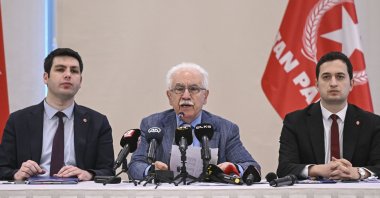 Doğu Perinçek (C) speaks at a news conference, in Istanbul, Türkiye, May 17, 2023. (AA Photo)