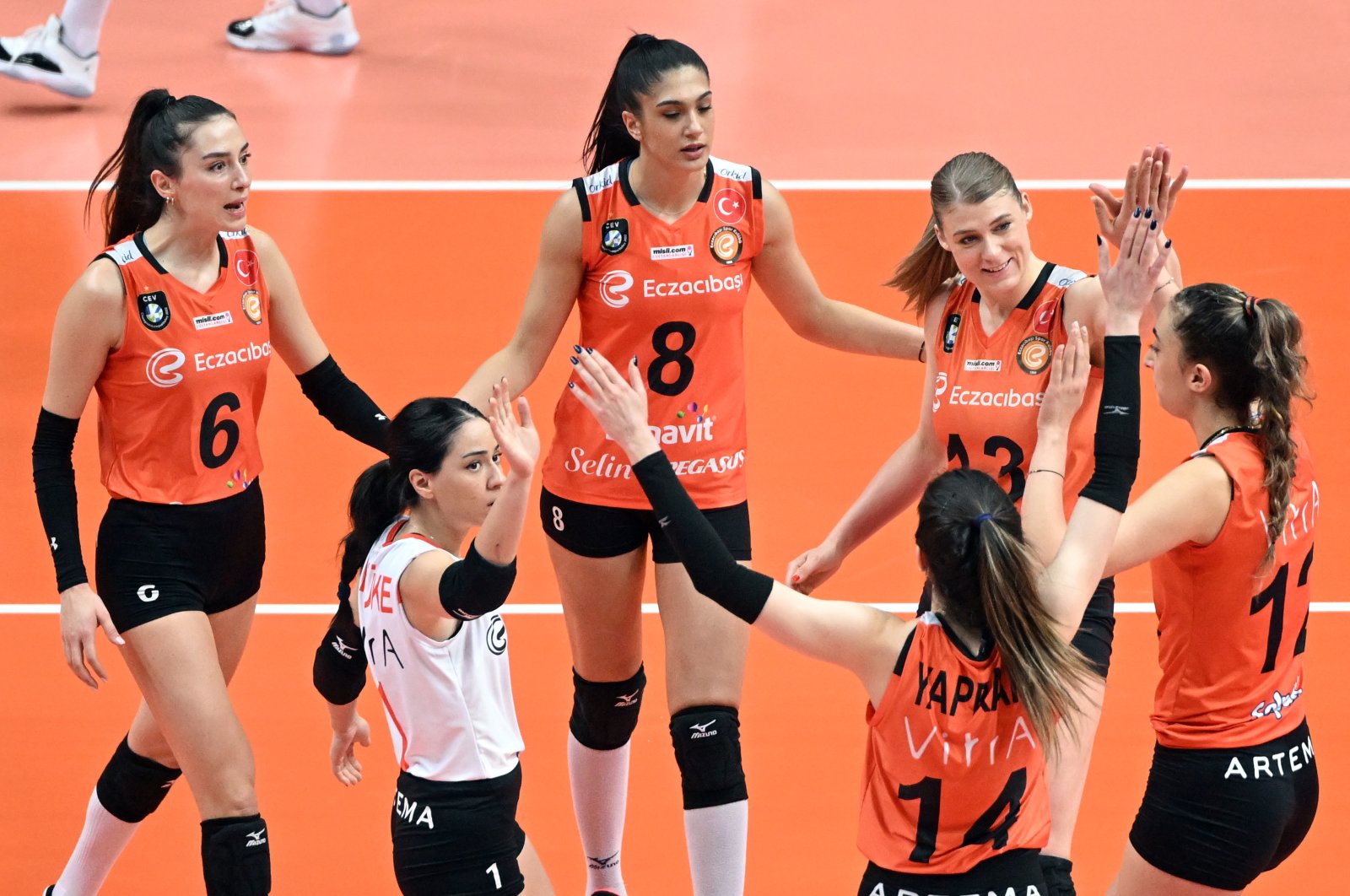 Eczacıbaşı women&#039;s volleyball players celebrate after scoring against İlbank at the Ankara TVF Volleyball Hall, Ankara, Türkiye, April 22, 2023. (AA Photo)