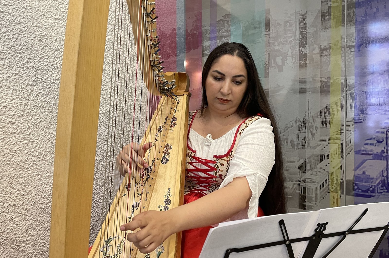 Musician Zeynep Öykü plays one of her domestically manufactured harps, in Bilecik, Türkiye, May 16, 2023. (AA Photo)