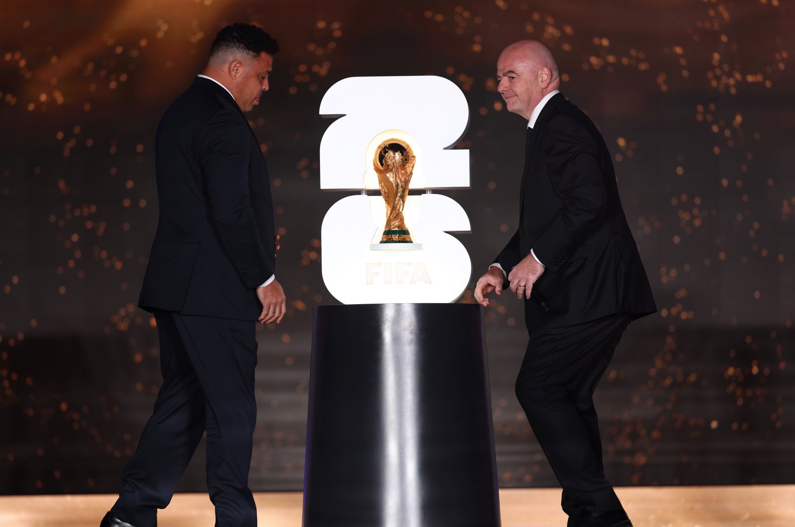 Ronaldo (L) and FIFA President Gianni Infantino onstage during the FIFA World Cup 2026 Official Brand Launch at the Griffiths Observatory, Los Angeles, U.S., May 17, 2023. (Getty Images Photo)