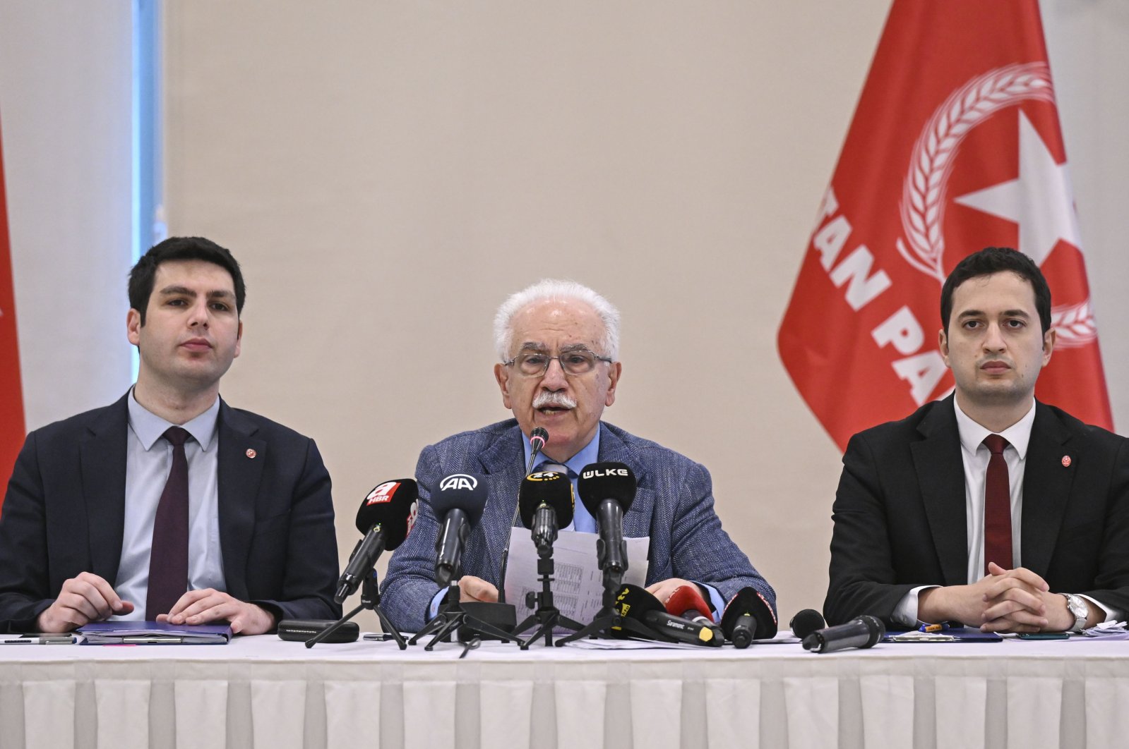 Doğu Perinçek (C) speaks at a news conference, in Istanbul, Türkiye, May 17, 2023. (AA Photo)