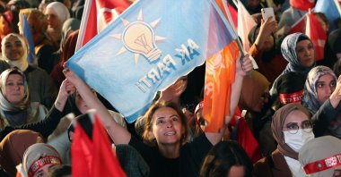 Supporters of President Recep Tayyip Erdoğan wave flags outside the AK Party headquarters after polls closed in Türkiye's presidential and parliamentary elections in Ankara, Türkiye, May 15, 2023. (AFP Photo)