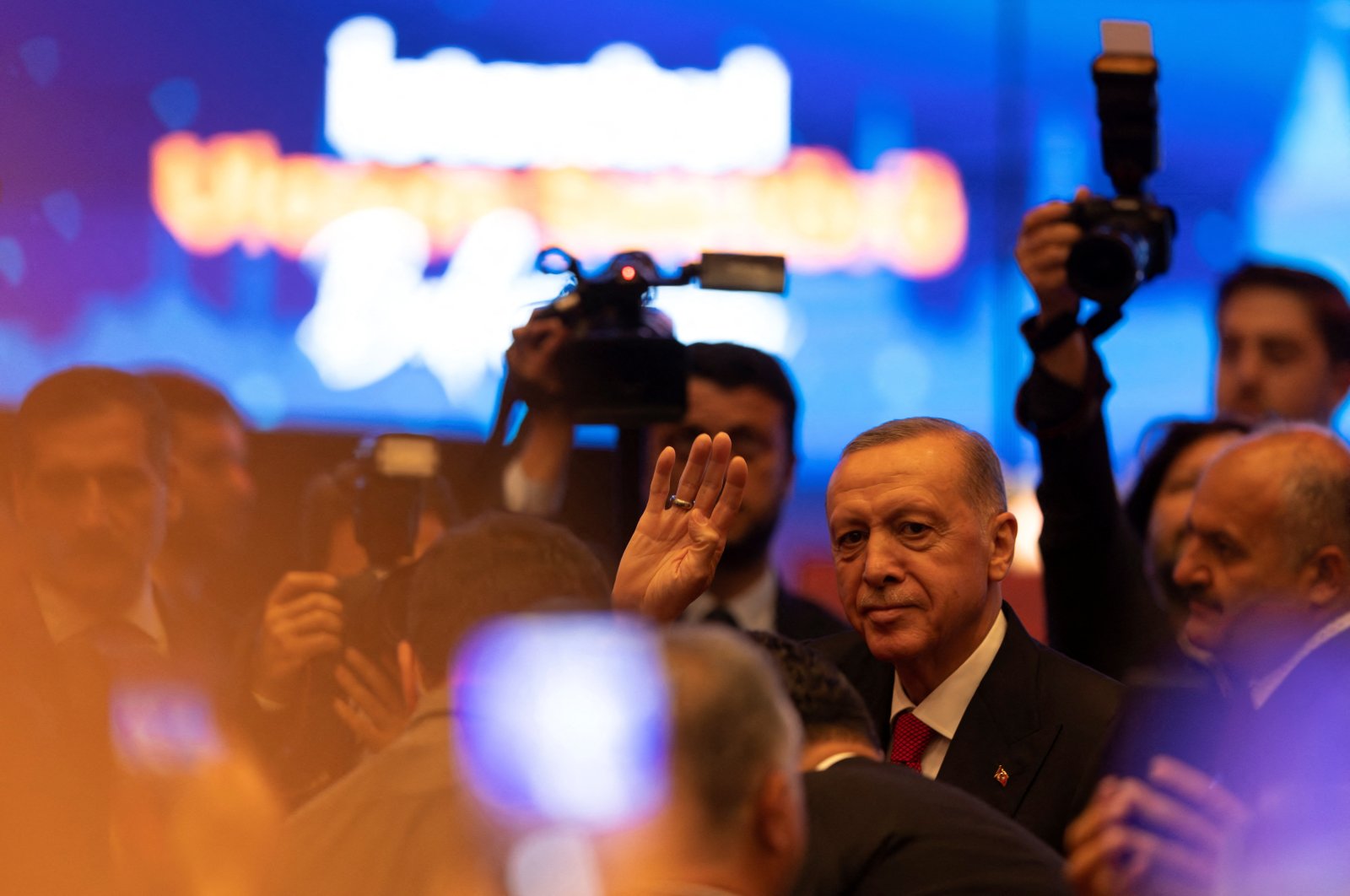 President Recep Tayyip Erdogan greets his supporters as he arrives for a meeting in Istanbul, Türkiye, May 18, 2023. (Reuters Photo)