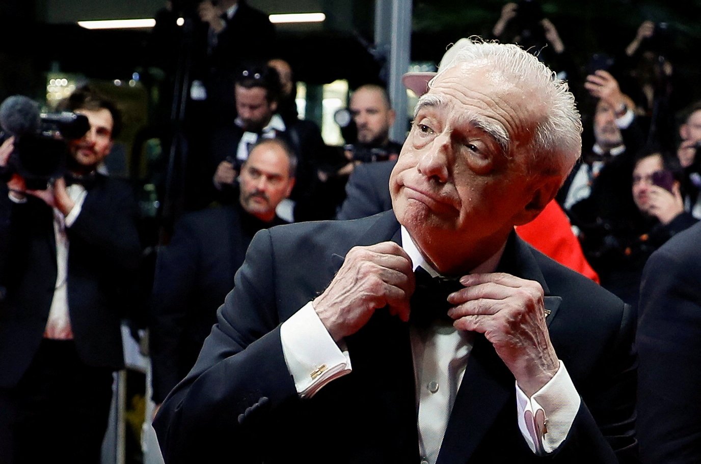 Sutradara Martin Scorsese berpose saat dia pergi setelah pemutaran film 