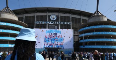 A banner in front of the Etihad reads 'champions' before a Premier Leauge match, Manchester, U.K., May 21, 2023. (Reuters Photo)