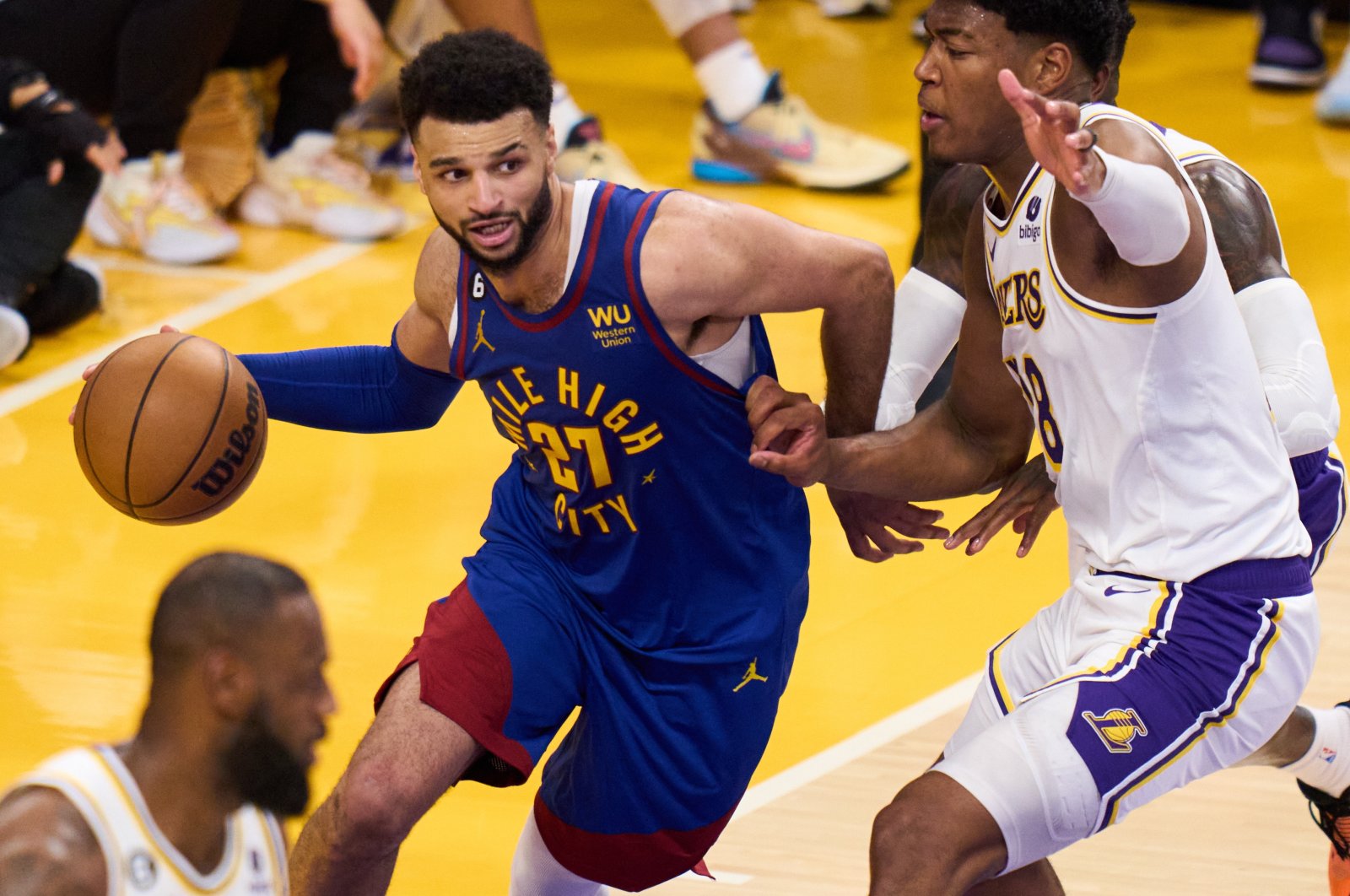 Nuggets guard Jamal Murray (L) drives to the basket during an NBA Western Conference Finals game against the Lakers, Los Angeles, California, U.S., May 20, 2023. (EPA Photo)