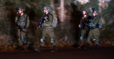 Israeli soldiers leave after a raid at the Balata refugee camp in the occupied West Bank city of Nablus, Palestine, May 22, 2023. (AFP Photo)