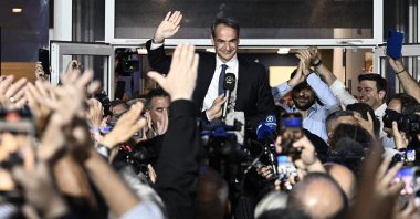 Prime Minister and New Democracy party&#039;s leader Kyriakos Mitsotakis celebrates with his supporters after his party&#039;s victory in elections in Athens, Greece, May 21, 2023. (AFP Photo)