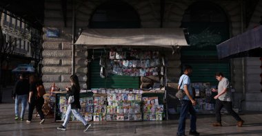 People walk next to a kiosk in Athens, Greece, May 22, 2023. (Reuters Photo)