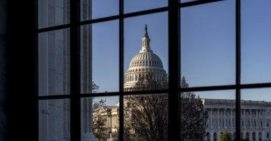 The U.S. Capitol seen through a window in the Russell Senate Office Building in Washington, U.S., March 15, 2023. (AP Photo)