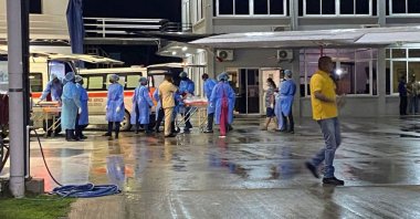 Children rescued during a Mahdia secondary school dormitory fire are transferred by medical personnel to hospitals in Gorgetown, Guyana, May 22, 2023. (AFP Photo)