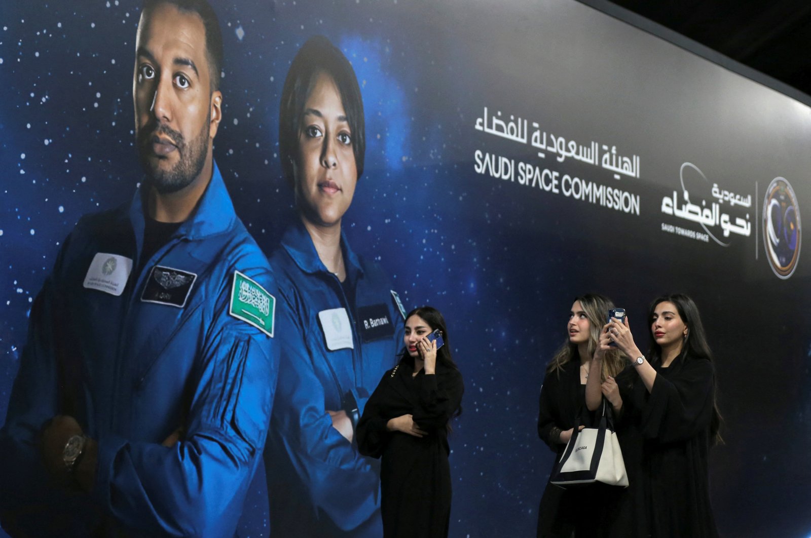 Saudi women arrive to watch the launch of a SpaceX Falcon 9 and Dragon capsule, part of the Axiom Mission 2 (Ax-2), carrying four astronauts, two of whom are Saudi nationals, in an event organized to celebrate the first Saudi woman into Space in Riyadh, Saudi Arabia, May 21, 2023. (Reuters Photo)