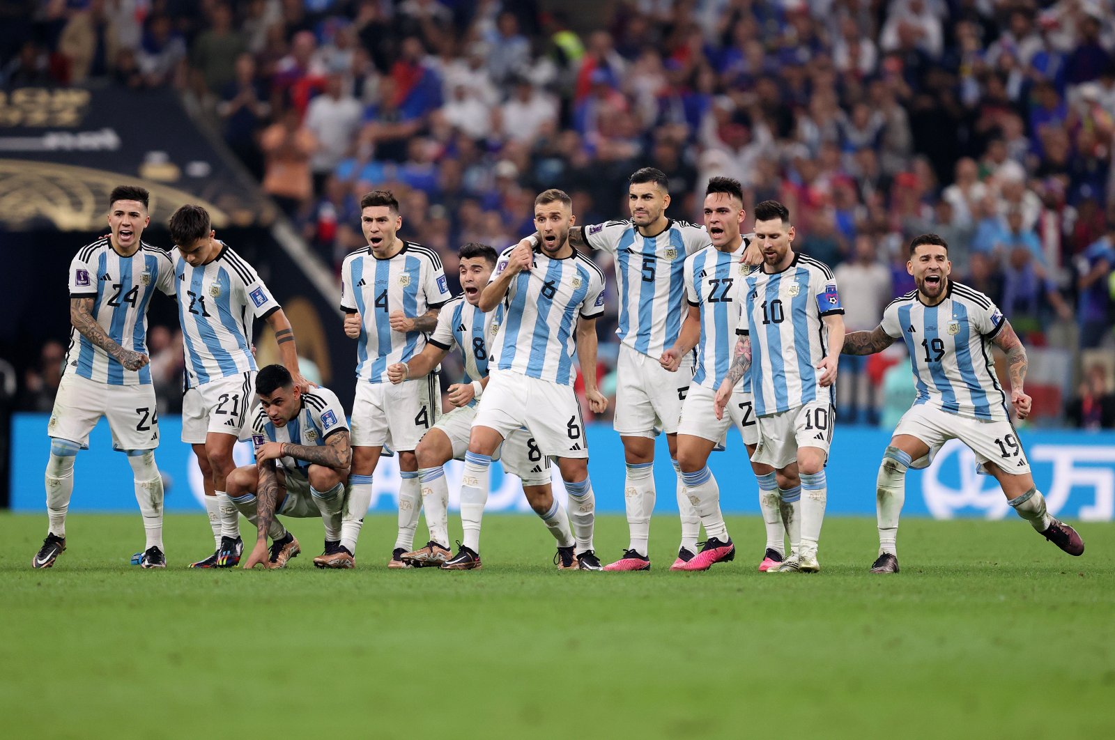 Argentina players react in the penalty shootout during the FIFA World Cup Qatar 2022 Final match between Argentina and France at Lusail Stadium, Lusail City, Qatar, Dec. 18, 2022. (Getty Images Photo)