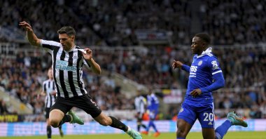 Newcastle&#039;s Fabian Schar (L) leaps over goalkeeper Nick Pope as he makes a save during the English Premier League match between Newcastle United and Leicester City at St. James&#039; Park, Newcastle upon Tyne, U.K., May 22, 2023. (AP Photo)