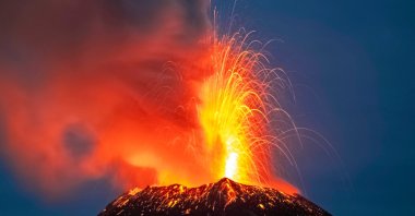 Incandescent materials, ash and smoke are spewed from the Popocatepetl volcano as seen from the Santiago Xalitzintla community, state of Puebla, Mexico, May 22, 2023. (AFP Photo)