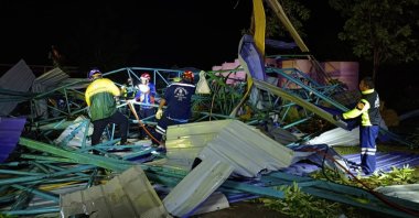 Thai rescuers at the scene of a collapsed metal roof, Phichit, northern Thailand, May 22, 2023. (AP Photo)