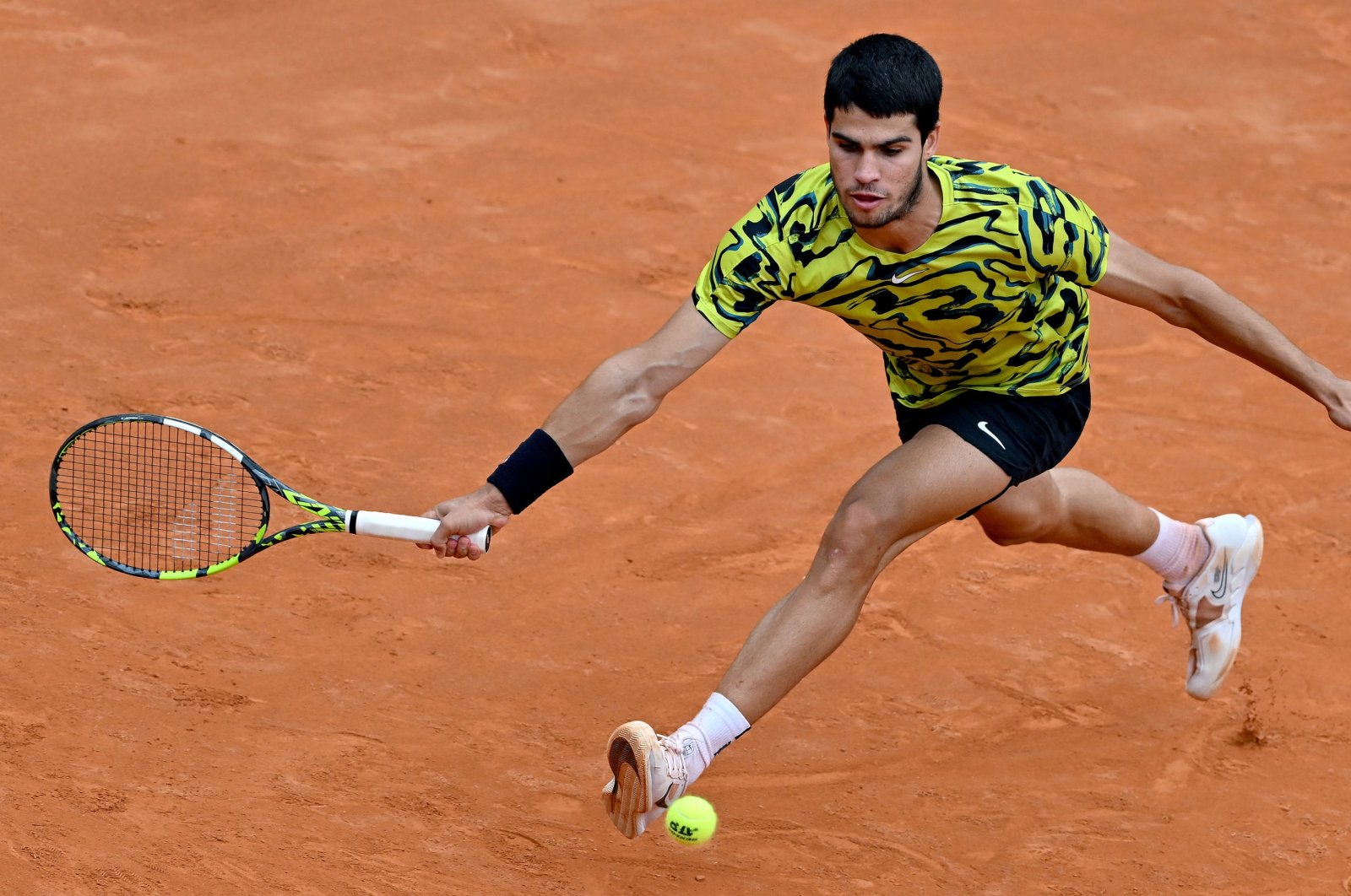 Spain&#039;s Carlos Alcaraz in action during his men&#039;s singles third round match against Fabian Marozsan of Hungary (not pictured) at the Italian Open tennis tournament, Rome, Italy, May 15, 2023. (EPA Photo)