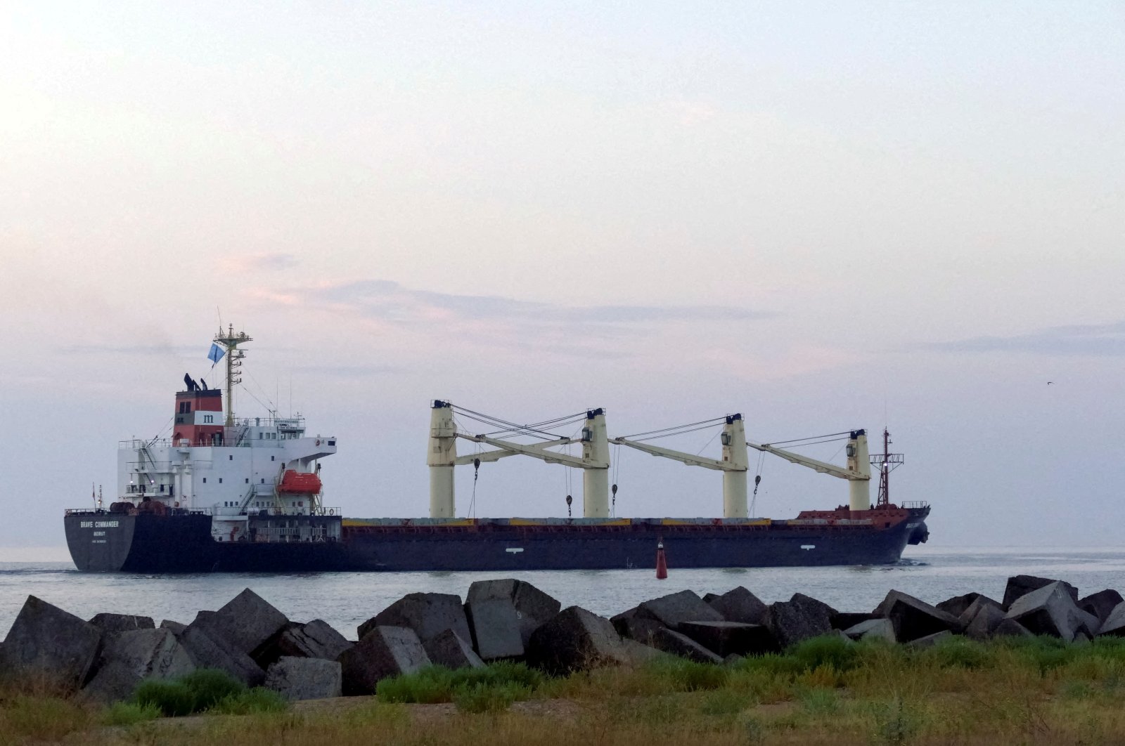 The Lebanese-flagged bulk carrier Brave Commander leaves the sea port of Pivdennyi with wheat for Ethiopia after the grain export resumption, in the town of Yuzhne, Odessa region, Ukraine Aug. 16, 2022. (Reuters Photo)