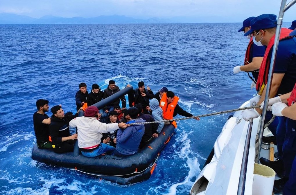 Turkish Coast Guard pull migrants pushed back by Greece to safety in Muğla, southwestern Türkiye, May 24, 2023. (AA Photo)