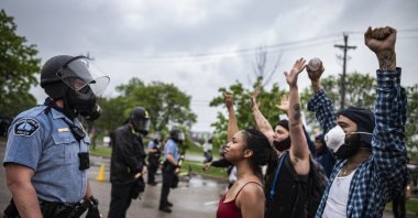 People face off with police near the Minneapolis 3rd Police Precinct during a rally to protest George Floyd's murder, Minneapolis, U.S., May 26, 2020. (Getty Images Photo)