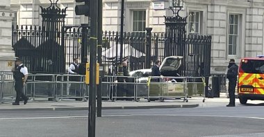 Police at the scene after a car collided with the gates of Downing Street in London, United Kingdom, May 25, 2023. (AP Photo)