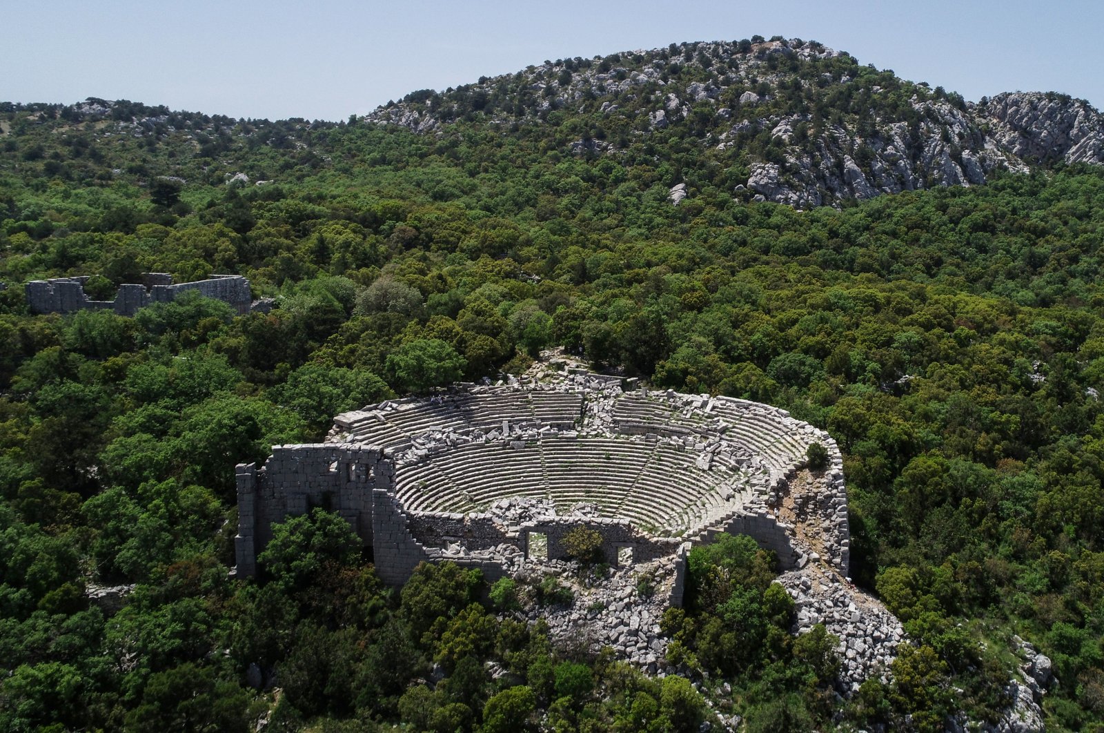 Termessos ancient city, known as the only city whose walls Alexander the Great couldn&#039;t overcome during his eastern campaign, captures attention with its necropolis areas, sarcophagi, structures, theater, wildlife, and endemic plants, Antalya, Türkiye, May 16, 2023. (AA Photo)
