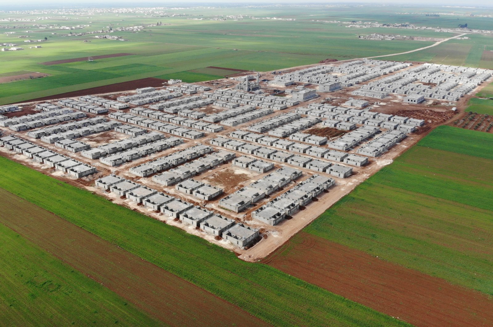 Aerial footage shows briquette homes built in northern Syria, May 25, 2023. (AA Photo)