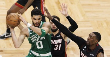 Boston Celtics forward Jayson Tatum (L) passes the ball as Miami Heat guard Max Strus (C) and Miami Heat center Bam Adebayo (R) defends during the third quarter of the Eastern Conference Finals playoff Game 5 at TD Garden in Boston, U.S., May 25, 2023. (EPA Photo)