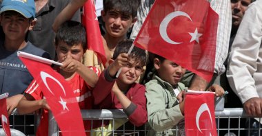 Syrians attend the inauguration of a Turkish-funded housing complex for the internally displaced, in the area of Ghandoura, in the countryside of Jarablus, Syria, May 24, 2023. (AFP Photo)