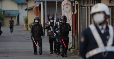 Police officers are seen near the scene of the stabbing attack, Nakano, Nagano Prefecture, Japan, May 26, 2023. (AFP Photo)
