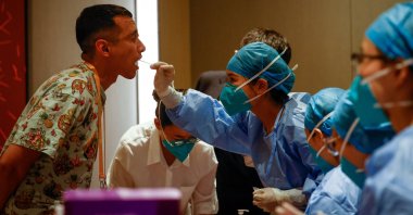 A journalist undergoes a COVID-19 PCR test ahead of the China-Central Asia Summit in Xi&#039;an, Shaanxi province, China, May 18, 2023. (EPA Photo)
