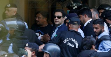 Security officers escort Pakistan&#039;s former Prime Minister Imran Khan, Islamabad, Pakistan, May 12, 2023. (Reuters Photo)