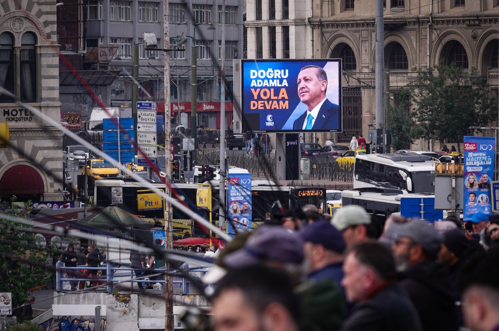 A picture of President Recep Tayyip Erdoğan is seen on a billboard on the Galata Bridge on Youth, Sports and Commemoration of Atatürk Day ahead of the presidential runoff on May 28, Istanbul, Türkiye, May 19, 2023. (Getty Images Photo)