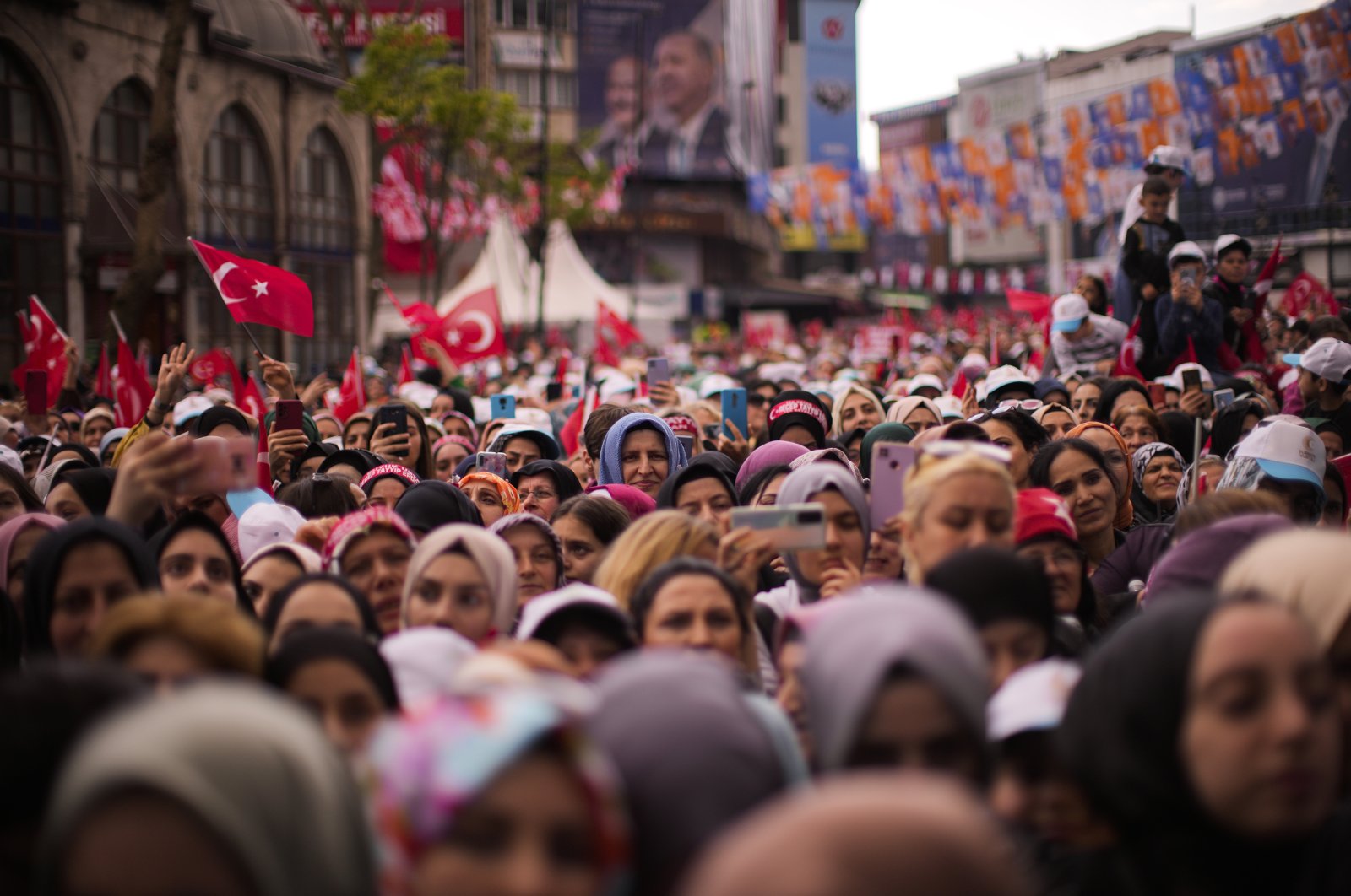 Supporters of People&#039;s Alliance&#039;s presidential candidate and President Recep Tayyip Erdoğan listen to his speech during an election rally campaign in Istanbul, Türkiye, April 21, 2023. (AP Photo)