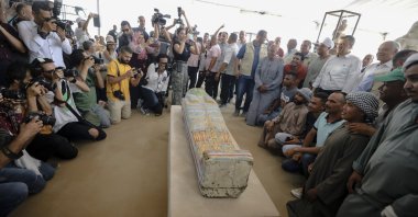 Members of the media and visitors view a sarcophagus that was found at the newly-discovered burial site in Saqqara, Giza Governorate, Egypt, May 27, 2023. (EPA Photo)
